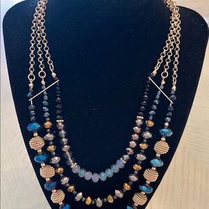Elegant Multi-Layered Gold and Blue Necklace